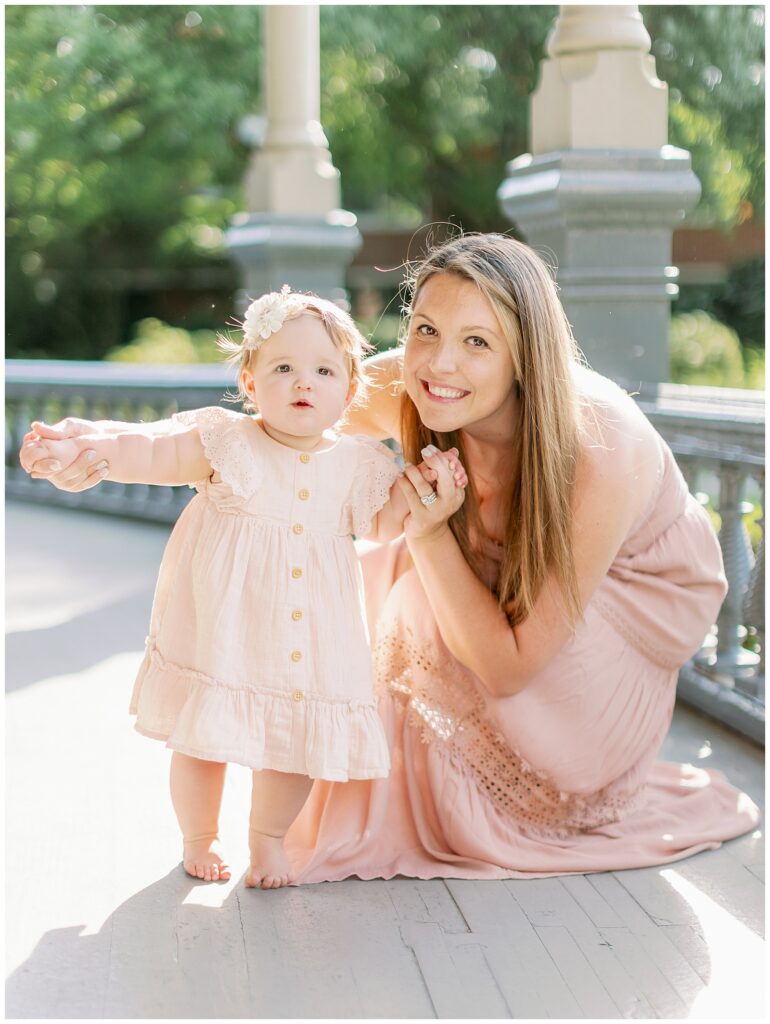 mom and baby girl pose at university of Tampa